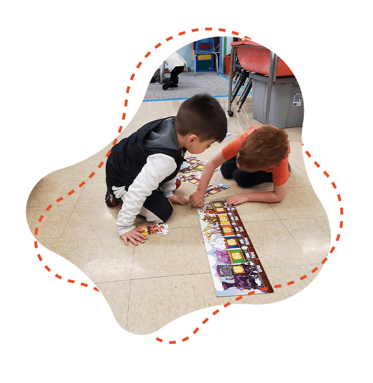 Two kids doing a school activity