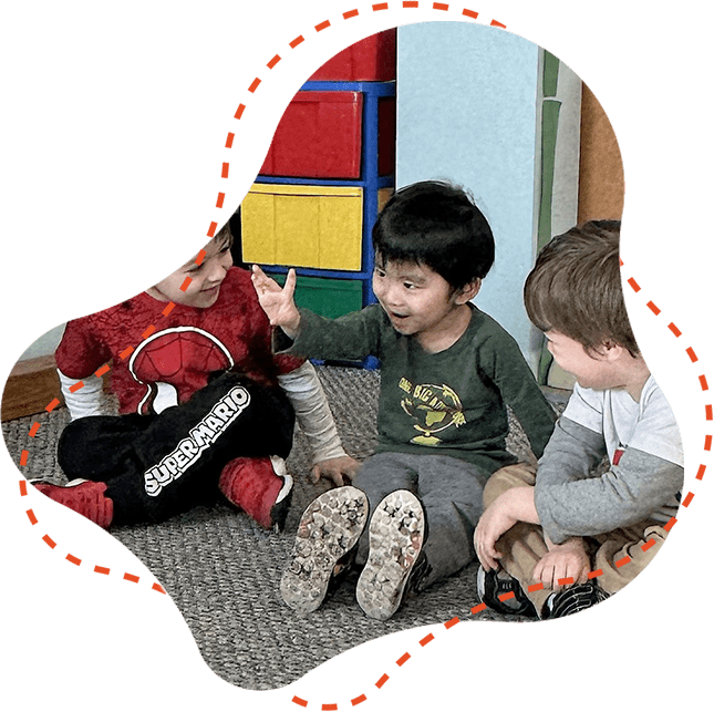 Three kids talking smiling together